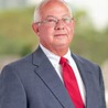 Dennis E. Dominic