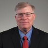 Terence J. Rhoades
