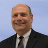 Dennis J. Scott