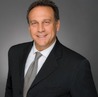Paul E Miller