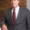 Gerald E. Coster
