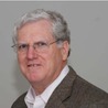 L. Andrew Koman